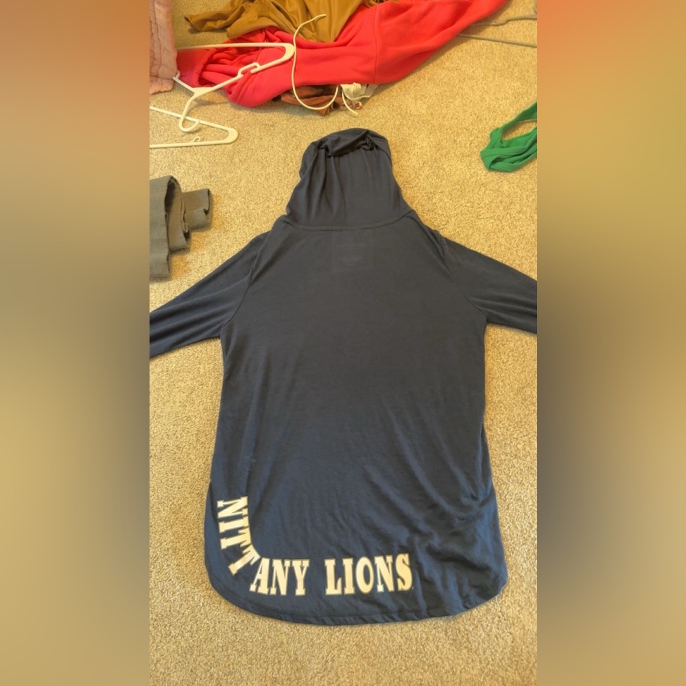 Penn state shirt.